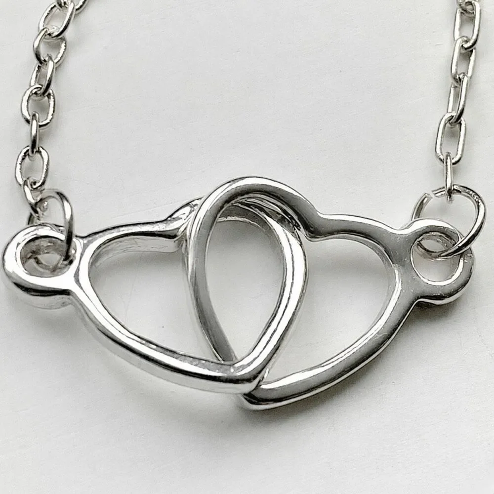 Hugging Hearts Silver Tone Necklace